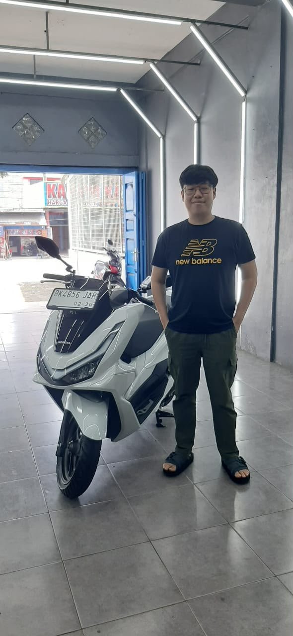 Hasil coating bodi mobil dengan kilap maksimal